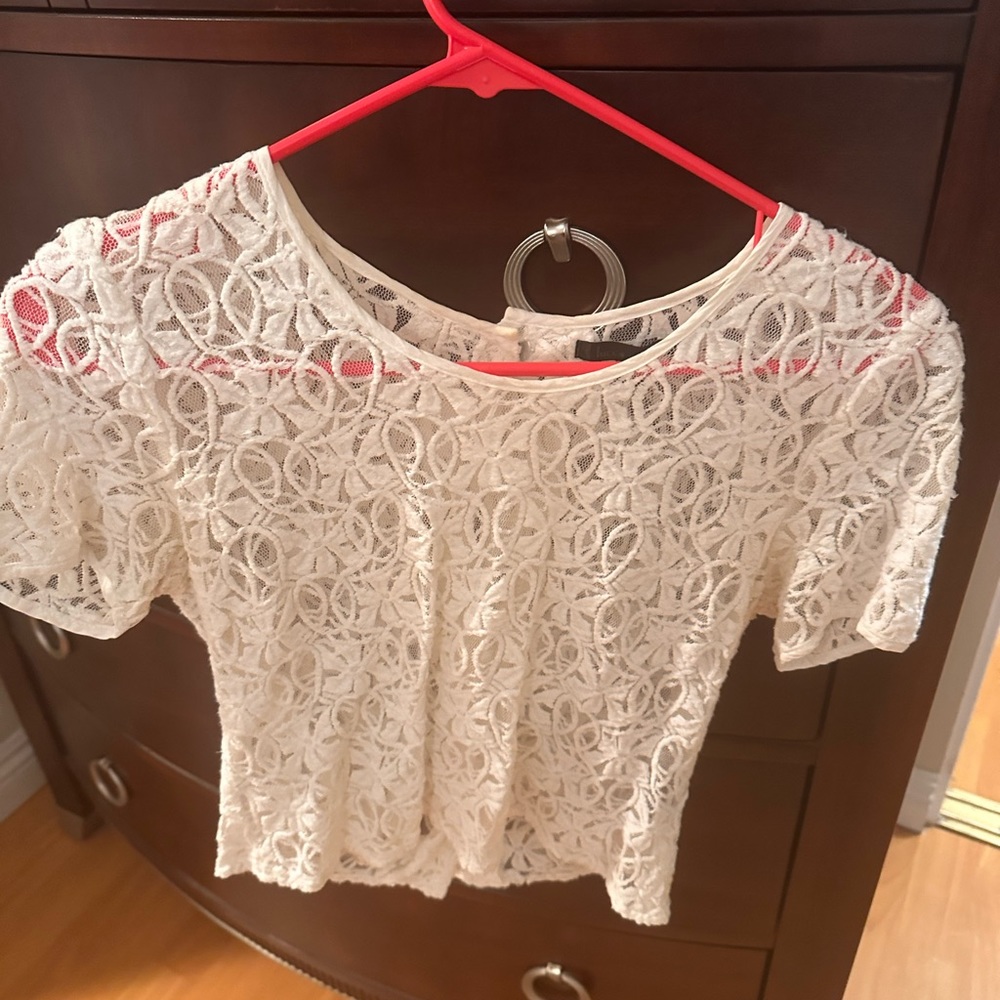 White lacy see through blouse. Short sleeve